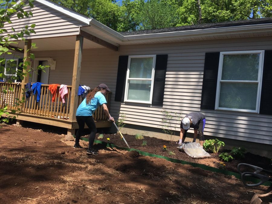 Senior Alexandra Mure constructs a garden for a family. 