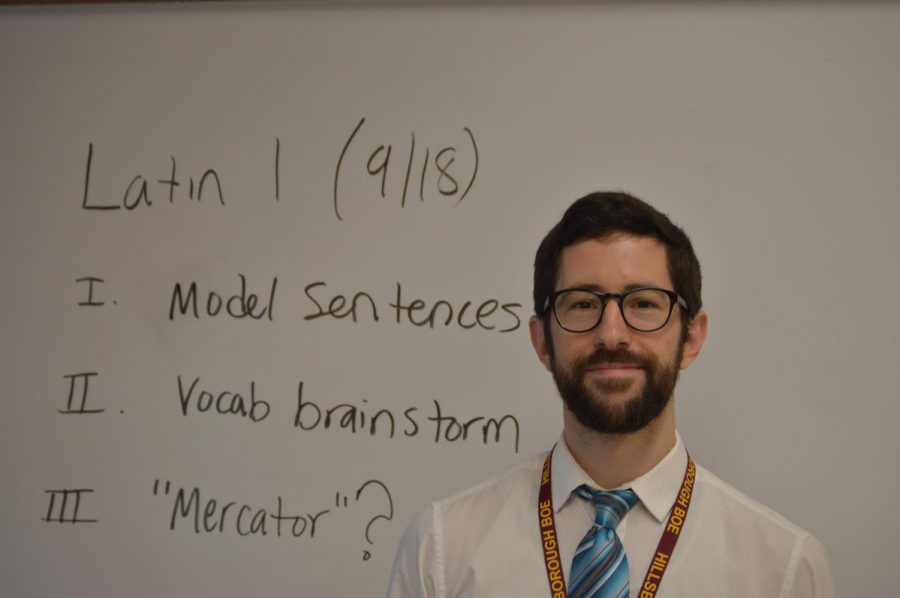 The new Latin teacher Brian Mumper is all smiles during his first semester at HHS.