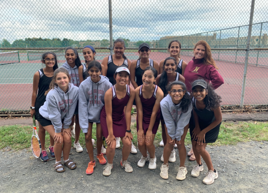 The girls tennis team is all smiles after an undefeated start to the 2019 campaign.