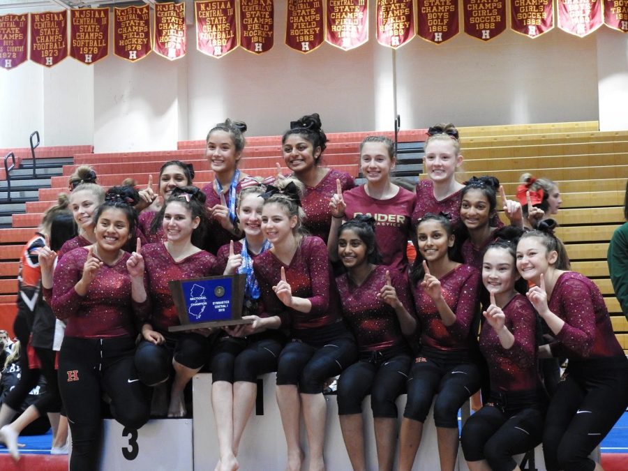 Hillsborough gymnasts celebrating their well deserved state championship.