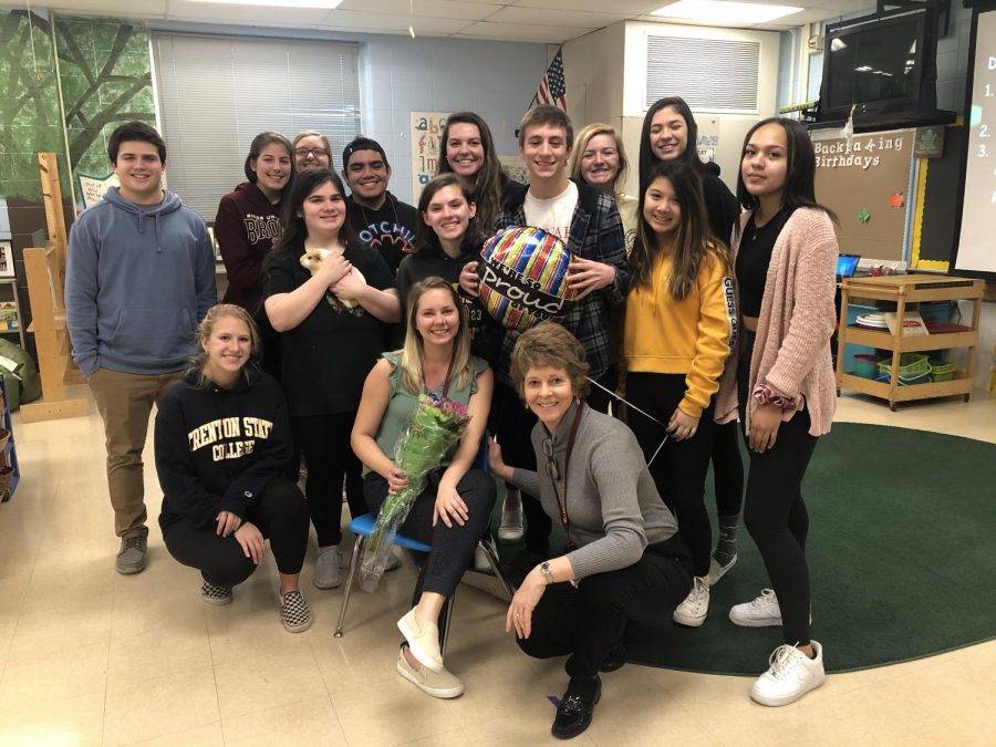 Jessica Hagood (seated) with her class after being named Teacher of the Year.
