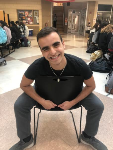 Josh Gershfeld poses in the cafeteria.