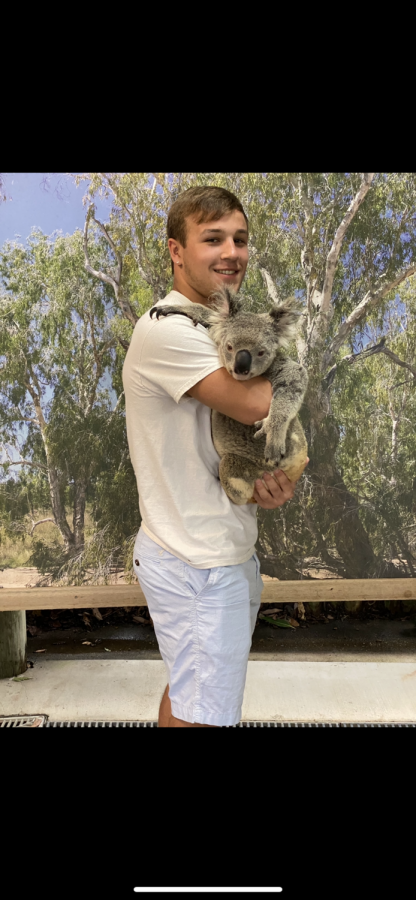 The Voice's staff writer, Sean Levonaitis, poses with a Koala 