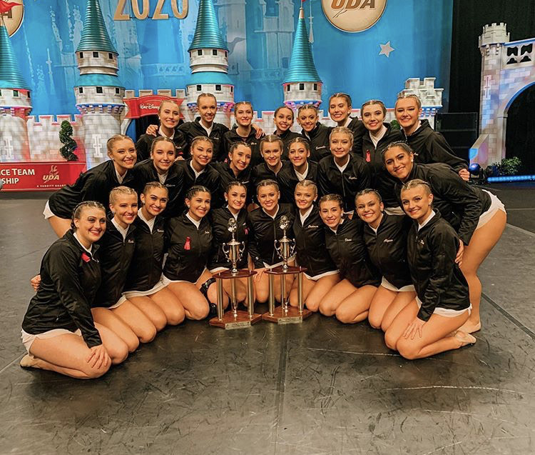 The Dance Team poses with their trophies 