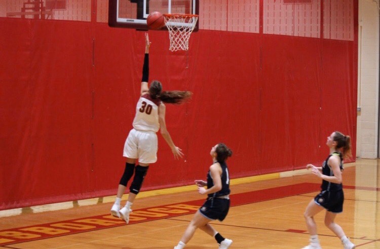 Senior Grace O'Connor drives to the basket. 