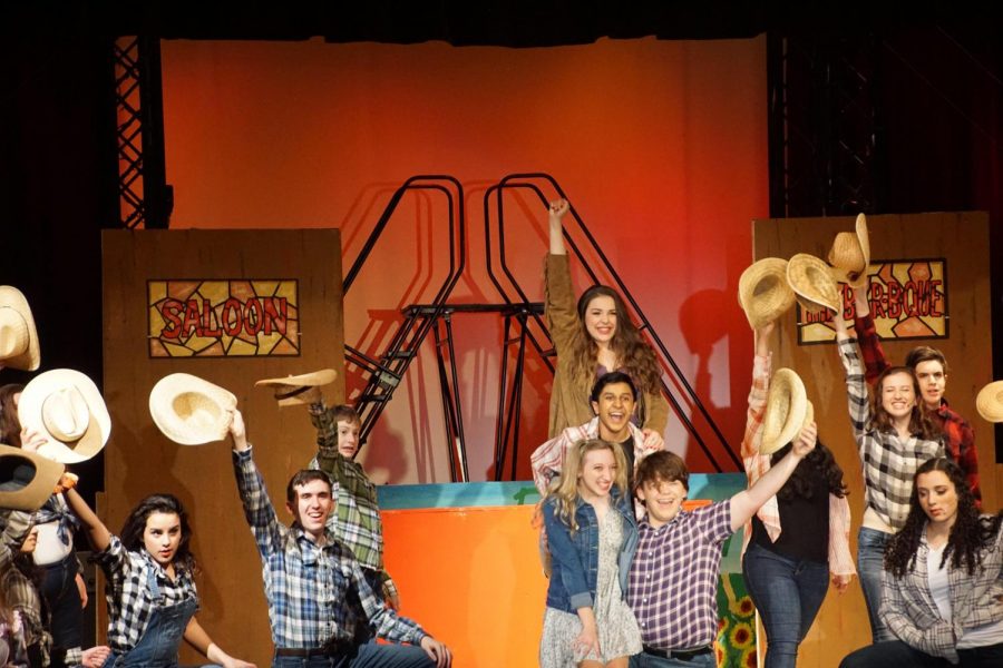 The cast of "Footloose" rehearses prior to opening night.