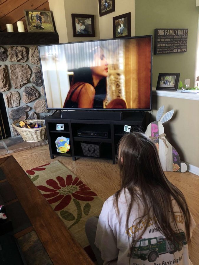 Junior Melissa Tucker sits down to relax as she watches her favorite show on Netflix, Vampire Diaries. 