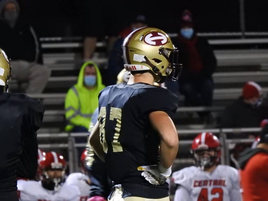 Junior Will Dixon waits for next play to begin.