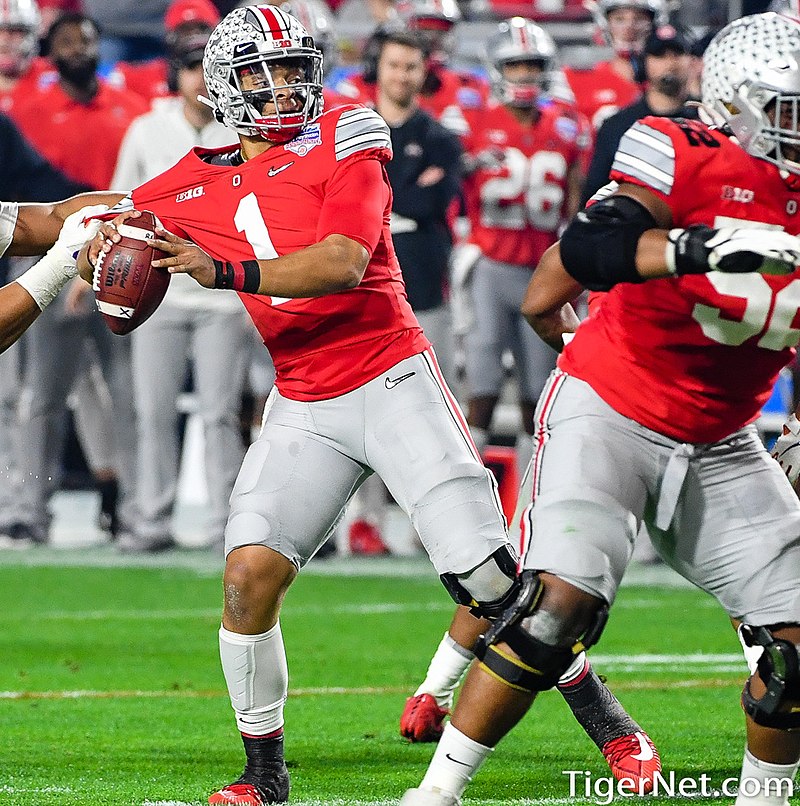 Ohio State quarterback Justin Fields prepares to launch a pass in the 2019 Fiesta Bowl.