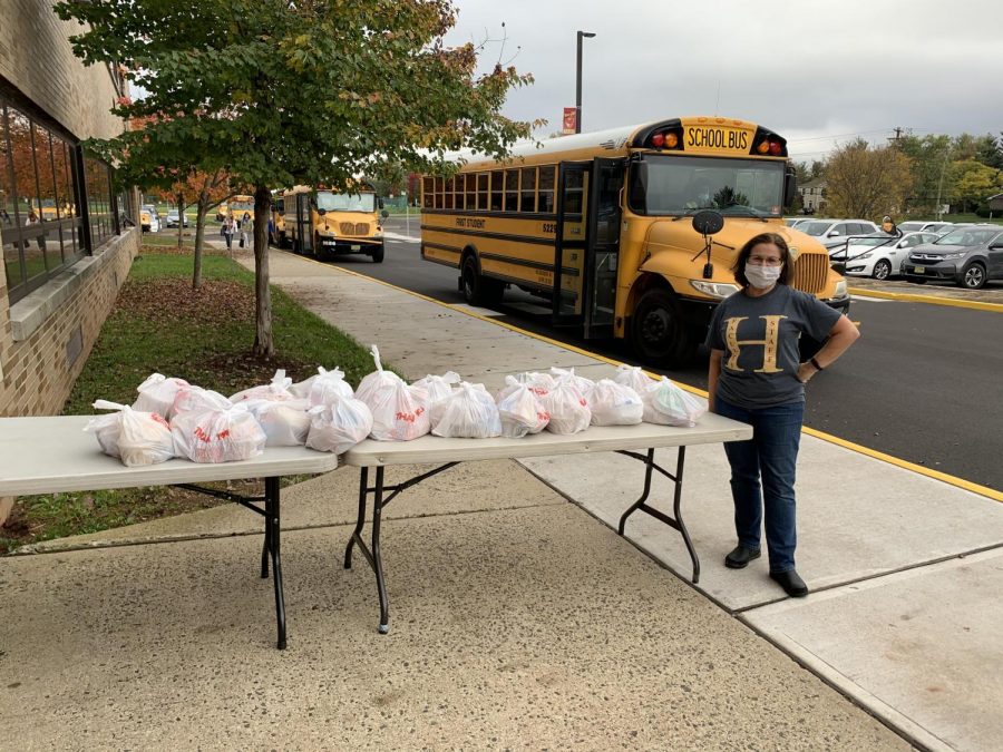 Arlene Kubek, a long time lunch lady at Hillsborough high school, stands by the free lunches she prepared one day after school. 