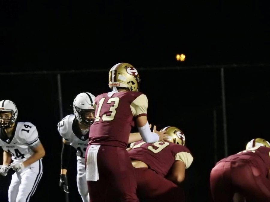 Junior Jay Mazuera receives the snap to make his play.