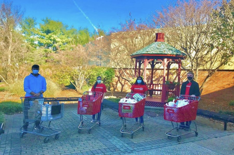 Seniors of the HHS Robotics Team donated over 250 canned food items after team fundraiser. 