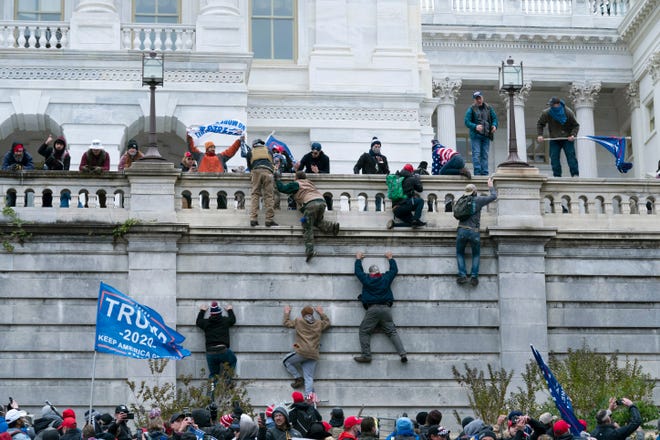 A group of Trump supporters stormed the Capitol building on Jan. 6, 2021, following a speech by the president. 