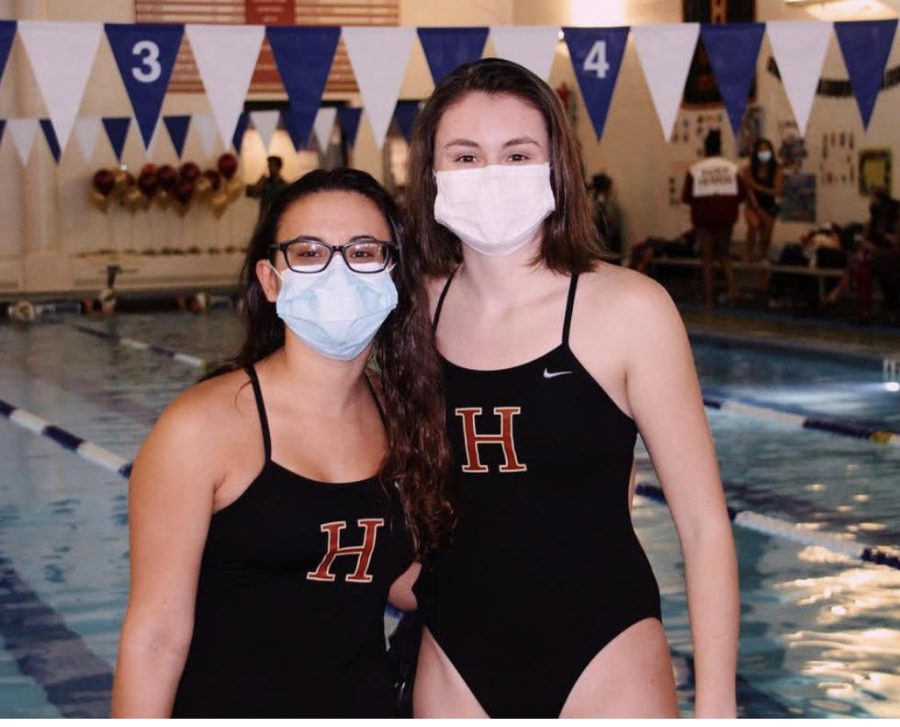 Seniors Maya Bhuyan and Erin McCrea celebrate their senior night for girls swim.