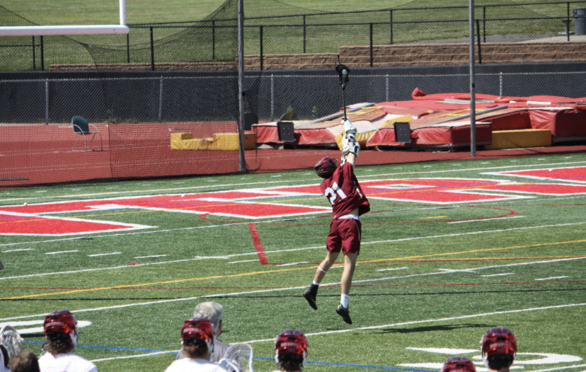 Loukas Ganas takes possession of the ball against Hunterdon Central.