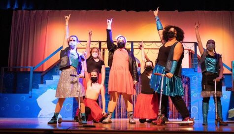 Gabriella Albanese, Elizabeth Beder, Charlee McLaughlin, and Marissa Niro perform Bikini Bottom Boogie during act two.