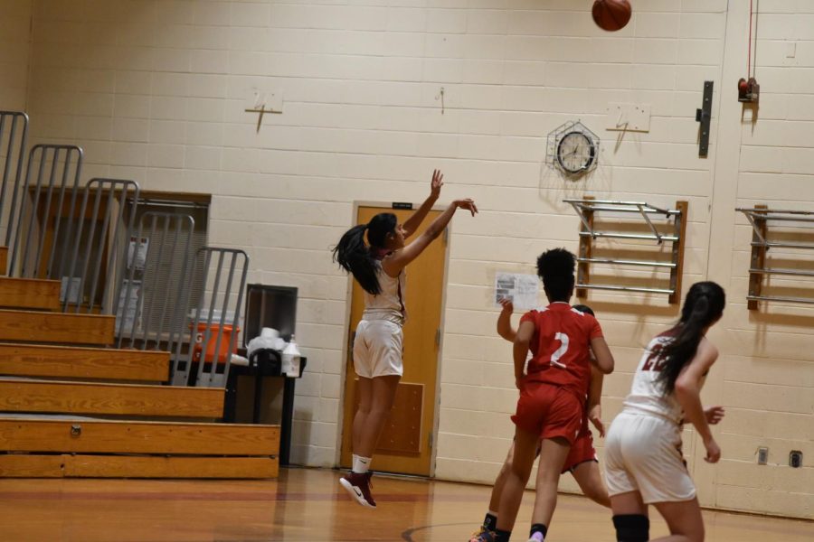 Senior Tanya Shah lined up for a shot.