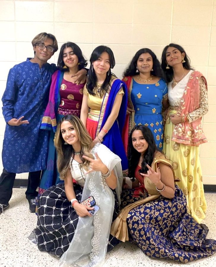 Seniors display their Garba fits with pride and joy. (bottom row, from left: Jasmine Iyer, Nisha Patel; top: Rohan Giri, Sheryl Thomas, Allyson Lee, Darshini Vijay, Anya Shah)