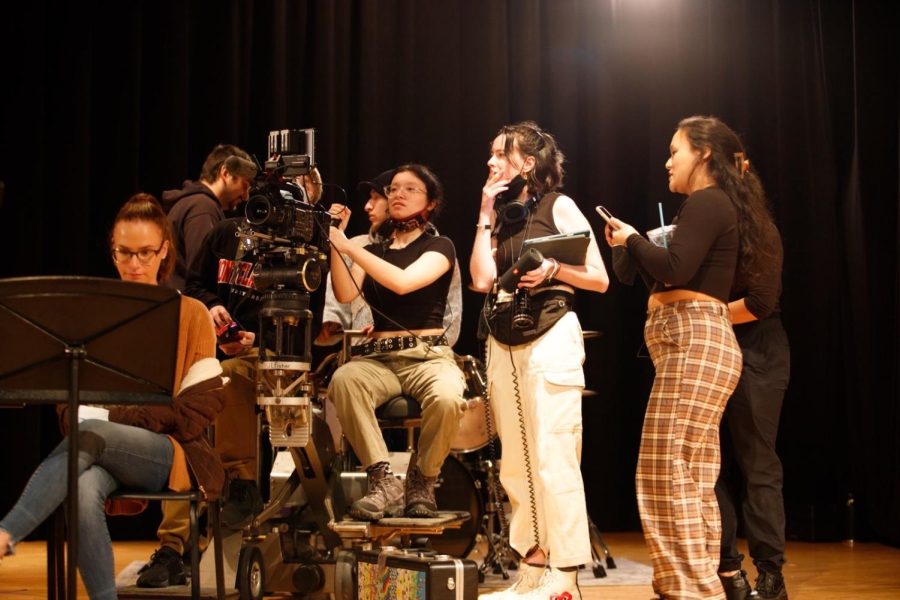 The team of “Tangerine Drum Machine” making movie magic in our HHS auditorium.