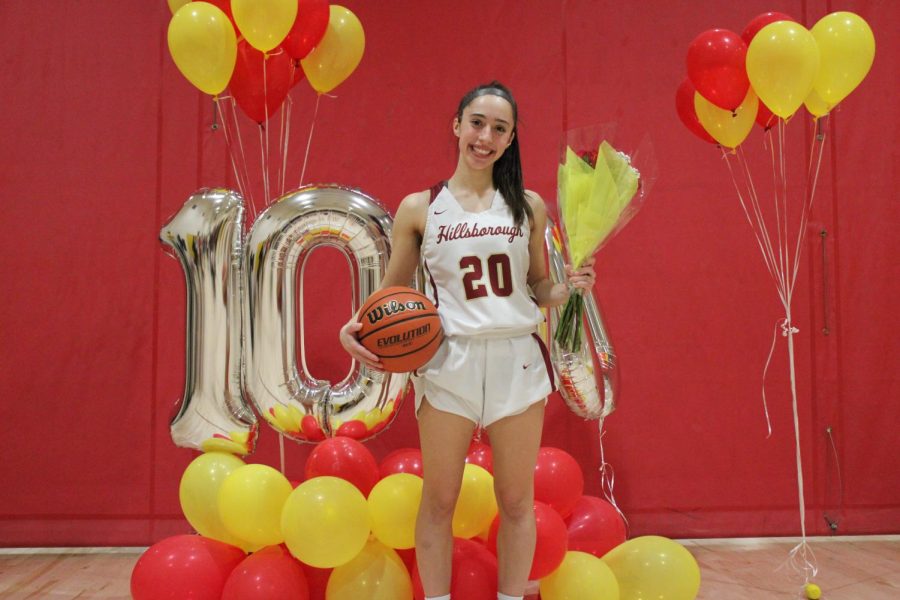 Senior Amy Rachilla celebrates reaching 1,000 career points.