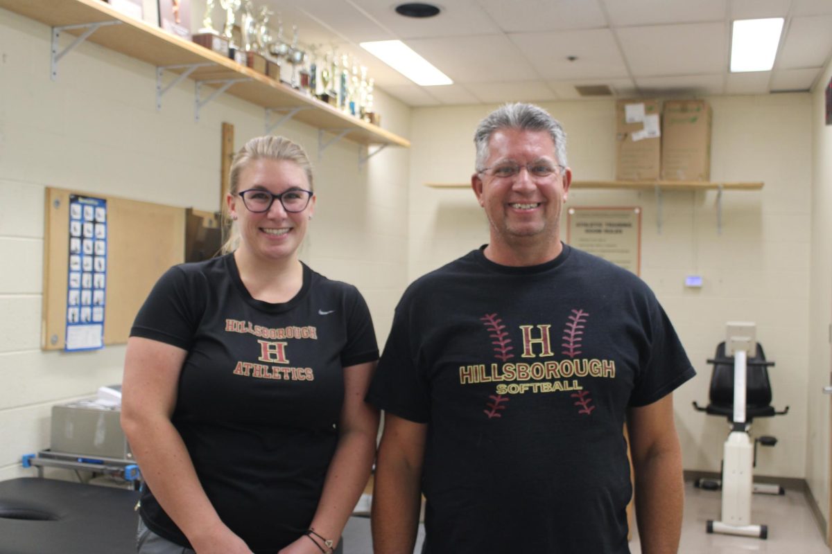 Trainers Amanda Miller and Michael Shiffman stand side-by-side. 