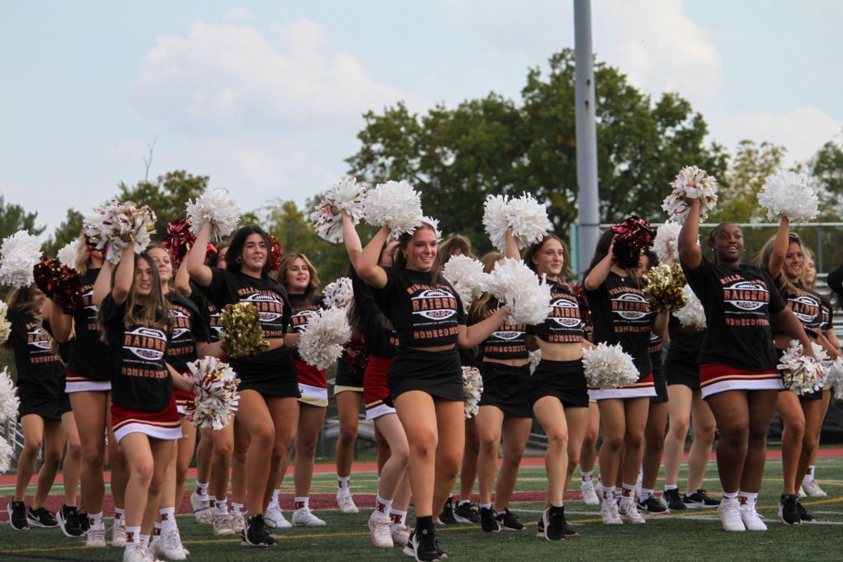 The HHS cheer and dance teams performed a lively routine to Thunderstruck by ACDC as the crowd cheered them on from the stands at the Homecoming Pep Rally.