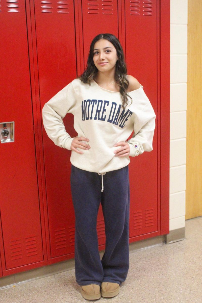 Mila Uhrlass often wears her favorite fall outfit to school: UGGs, sweatpants, and an off-the-shoulder sweater.