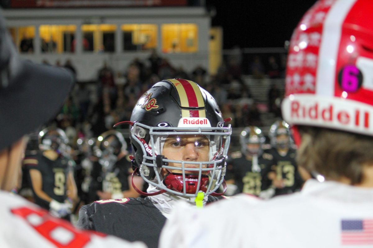 Senior running back and highlight of the Raiders' offense, Jackson Jankowicz, on the field.