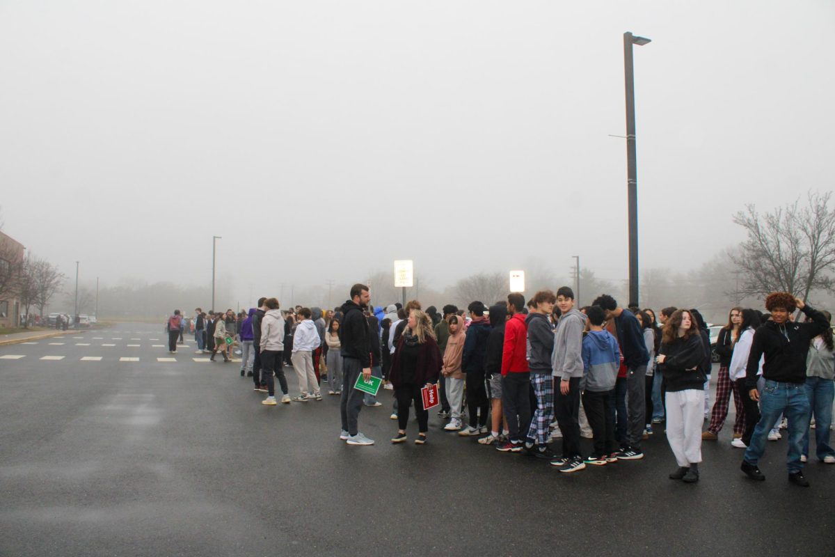 Staff and students wait outside while they wait for the rest of the building to be cleared during a Period 2 Fire Drill on December 10th.