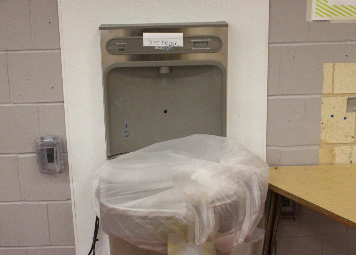 A covered water fountain station in the HHS Commons