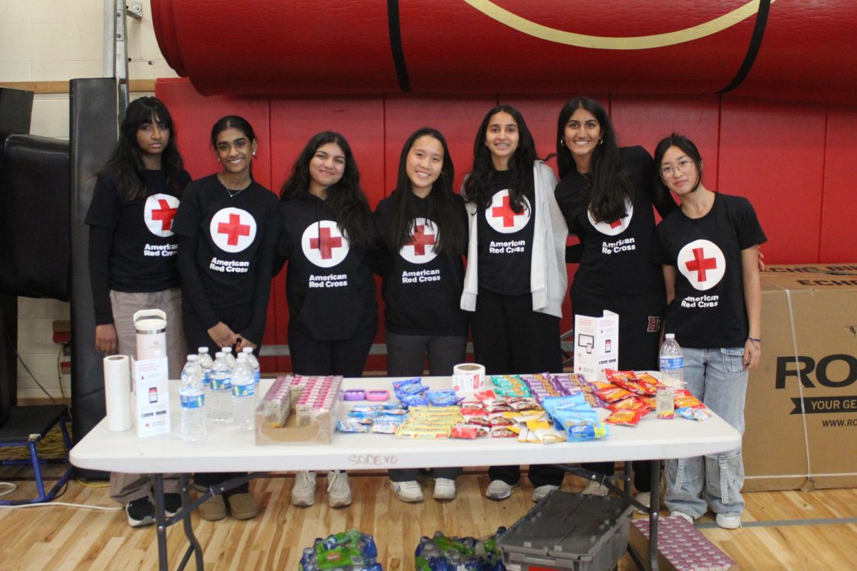 Red Cross Club members Nithila Sengottuvelan, Nitya Balasubramanian, Shaiana Jane Sanjiv, Valerie Ngo, Neha Dewkar, Hashika Faria, and Lian Chu provide snacks for the student blood donors.