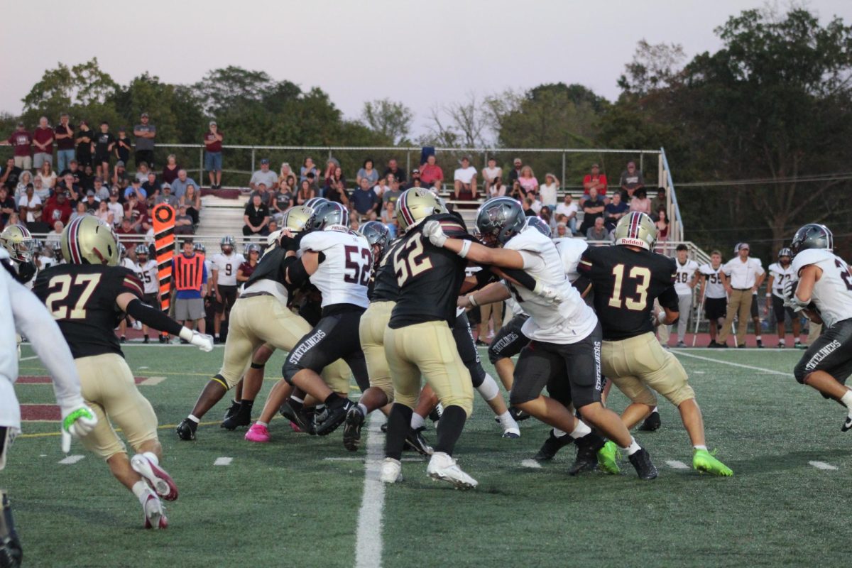 Action intensifies in the first quarter as the Raiders defense engages Phillipsburg's' offensive line. 