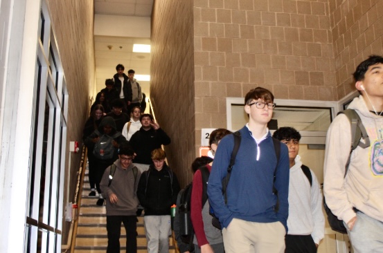 Students walk down the Common's stairway.