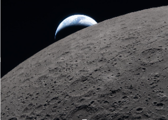 Artemis took a picture as they orbited the Moon, giving way to a picture of the Earth, rising from behind it.